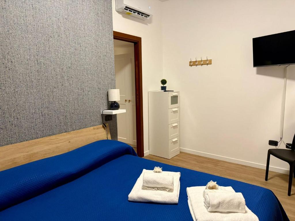 Ένα ή περισσότερα κρεβάτια σε δωμάτιο στο Dea Bendata HERMES