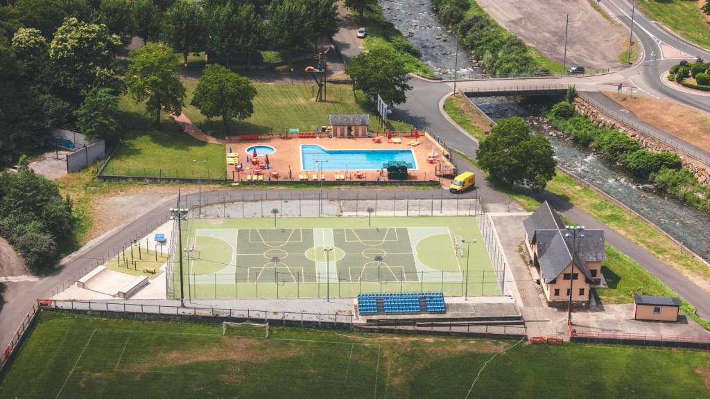 an aerial view of a tennis court in a park at HolaCamp Aran Aventura in Les