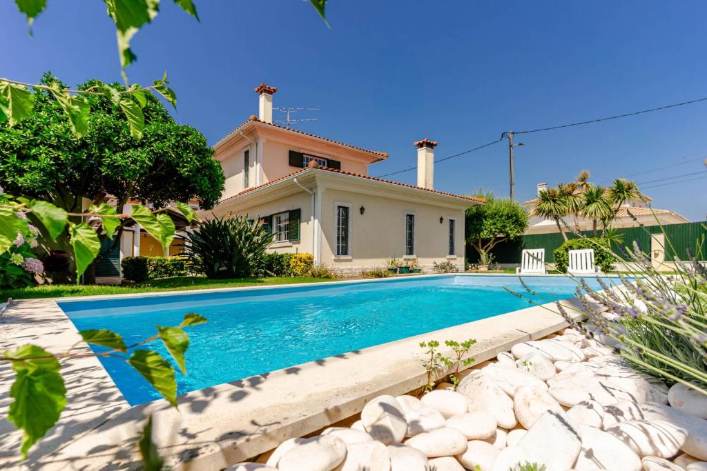 Bazén v ubytování Cravo's House nebo v jeho okolí