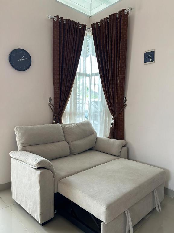 Χώρος καθιστικού στο Magnolia Homestay