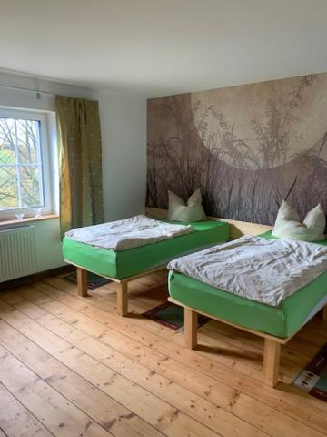 Ένα ή περισσότερα κρεβάτια σε δωμάτιο στο Outside by Katharina