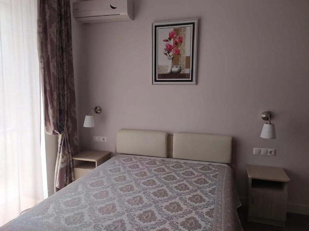 Ένα ή περισσότερα κρεβάτια σε δωμάτιο στο Weiße Wohnung