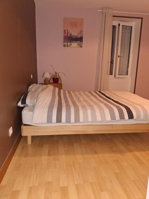 Postel nebo postele na pokoji v ubytování gite de la voie ferrée