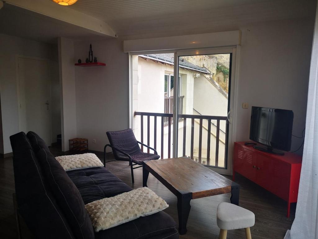 Et opholdsområde på Appartement semi-troglodytique