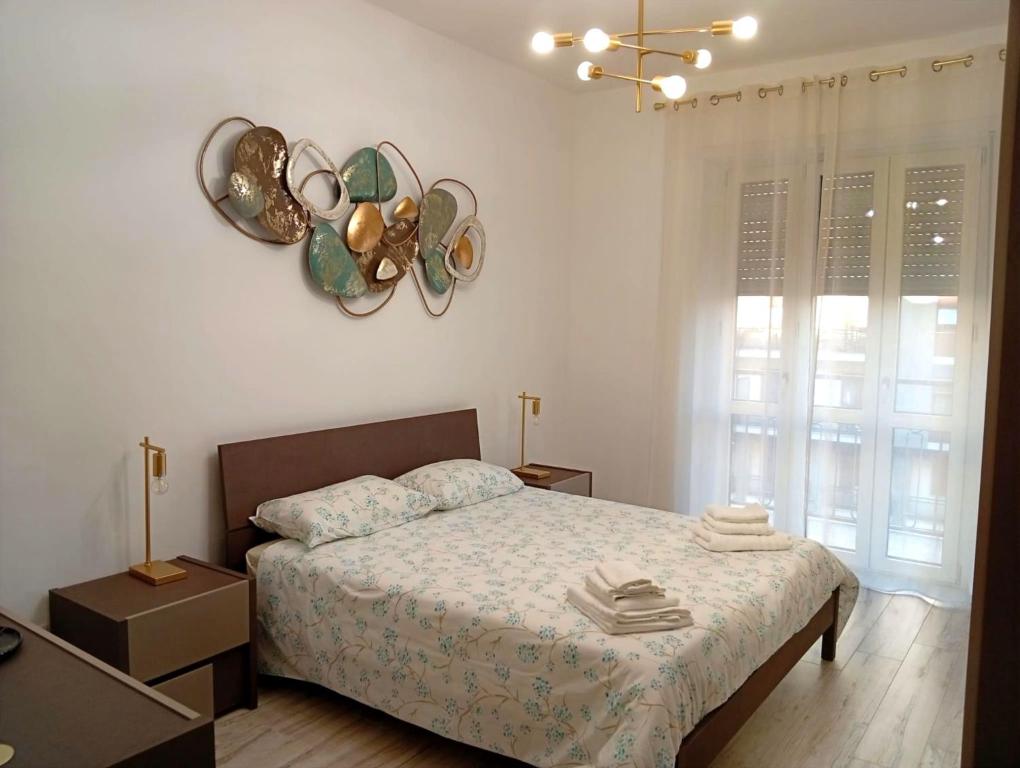 Postel nebo postele na pokoji v ubytování Casa Gessi 21-Olimpico, Inalpi, Politecnico-