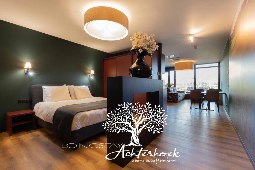 Ένα ή περισσότερα κρεβάτια σε δωμάτιο στο Longstay Achterhoek