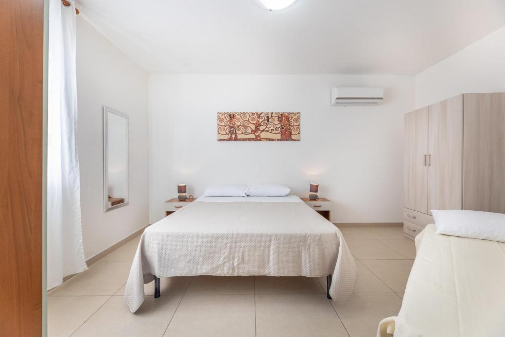 Ένα ή περισσότερα κρεβάτια σε δωμάτιο στο casa relax