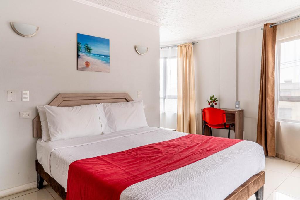 Ένα ή περισσότερα κρεβάτια σε δωμάτιο στο Hotel Veas