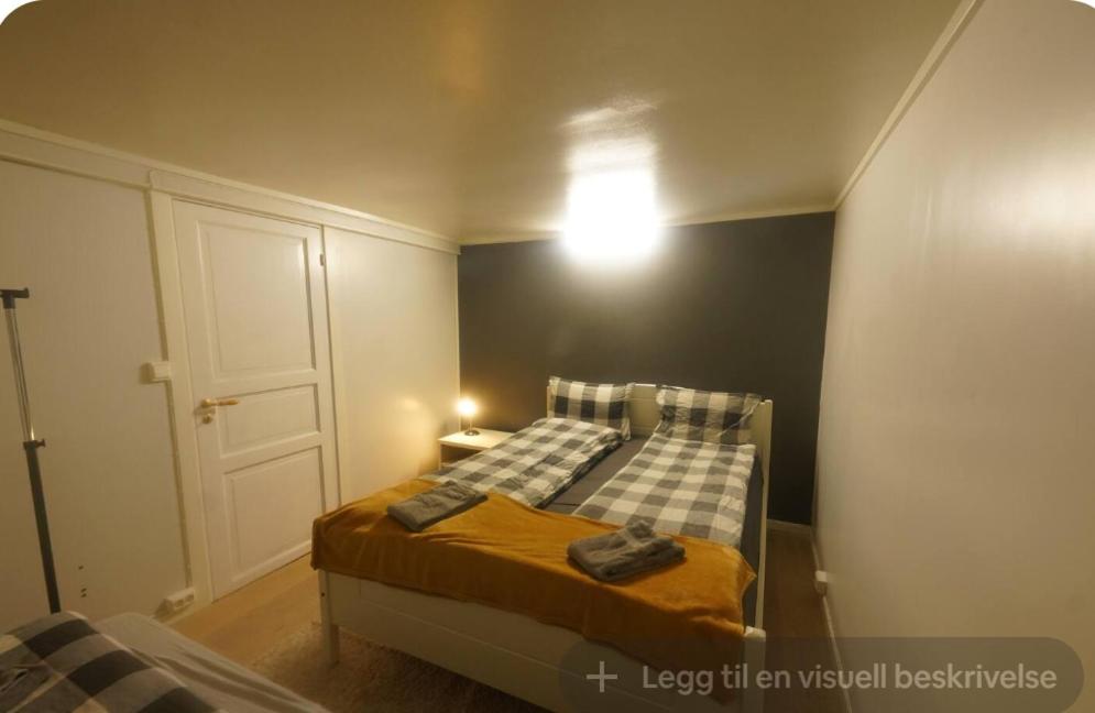 Ένα ή περισσότερα κρεβάτια σε δωμάτιο στο Aurora Rooms