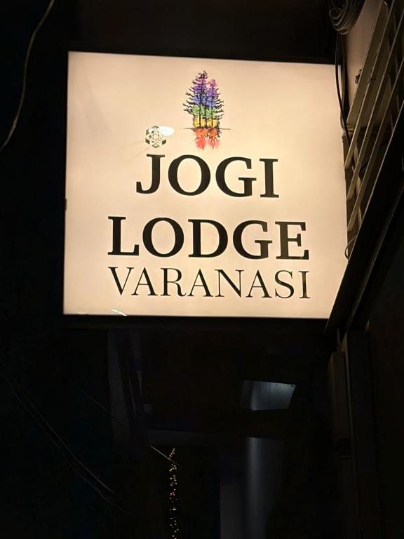a sign for a jostle vance varanish at Jogi Lodge in Varanasi