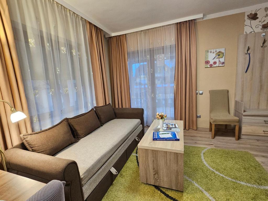 Khu vực ghế ngồi tại Apartman Siesta Bük - Bükfürdő