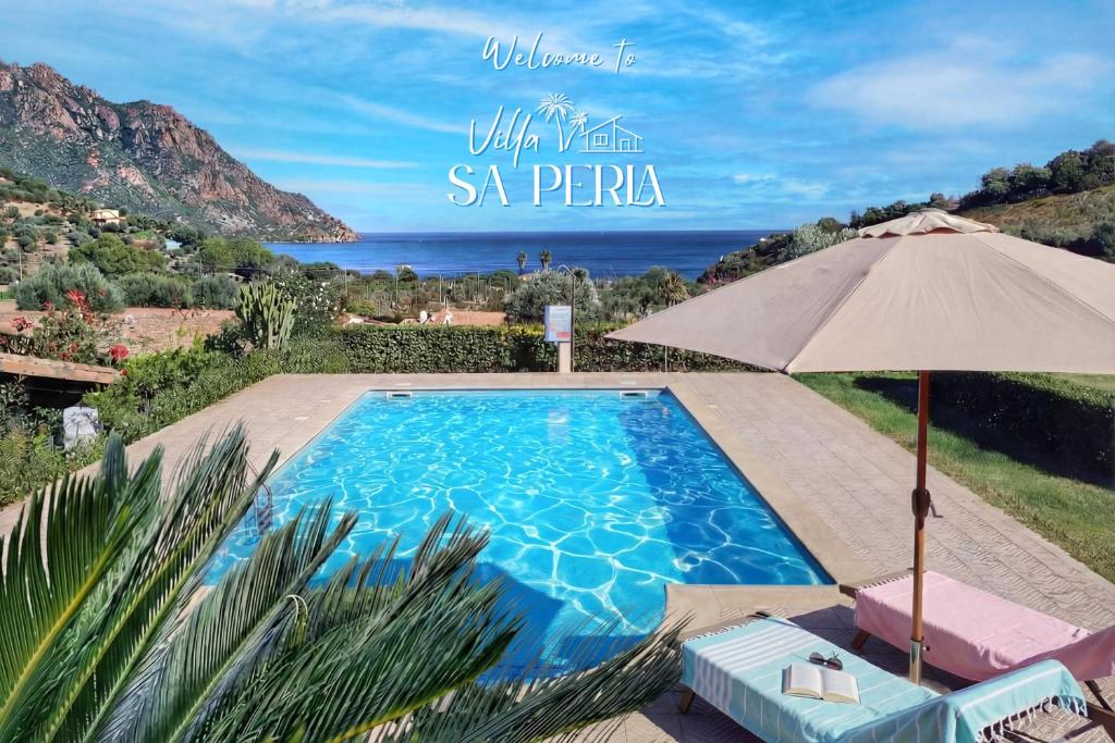 a swimming pool with a view of the ocean at Villa Sa Perla - Pool, Panoramic View, 250m to Seafront, 650m to Beach in Marina di Gairo
