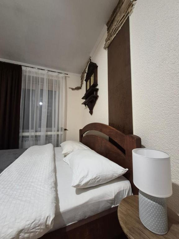 Ένα ή περισσότερα κρεβάτια σε δωμάτιο στο 4 Кімнатні Апартаменти в Центрі, вул Незалежності, 5