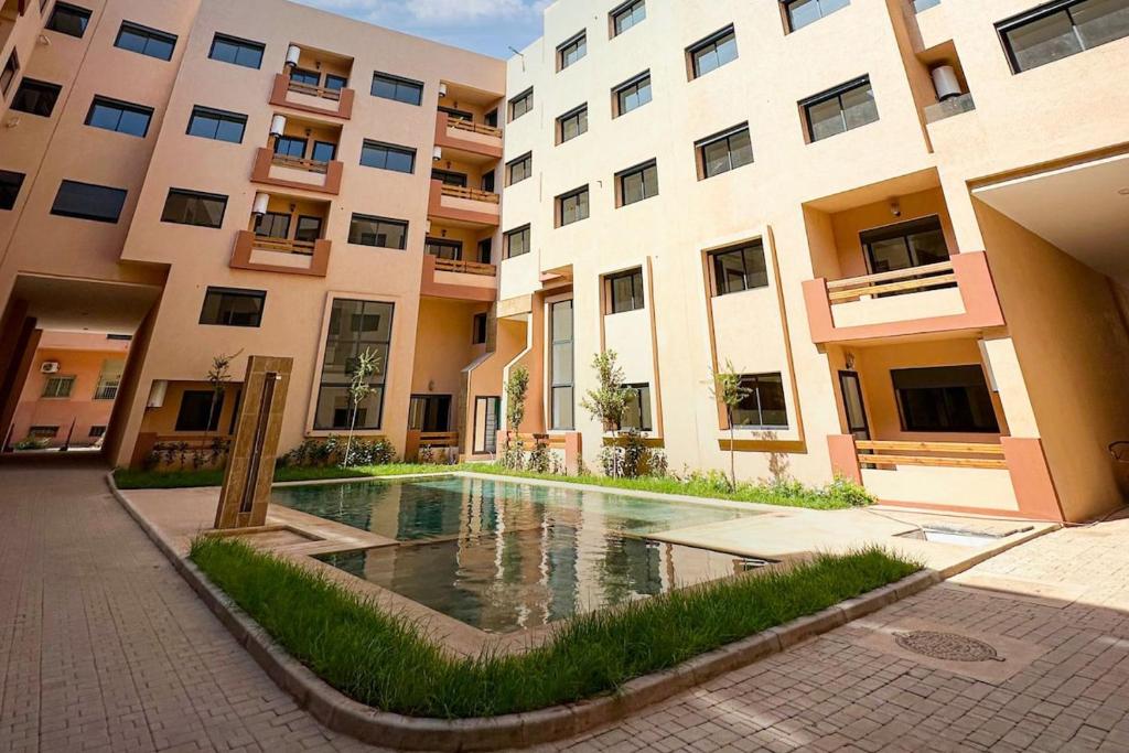 Ảnh trong thư viện ảnh của Garden View- Gueliz-Majorelle appartement 2 chambres- Wifi et piscines ở Oulad Akkou