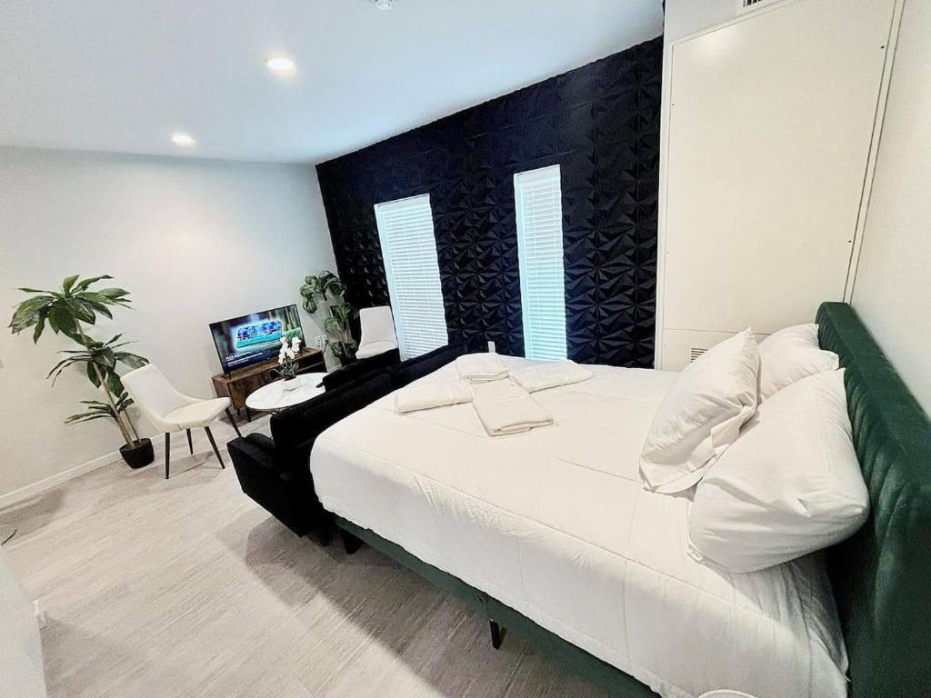 Ένα ή περισσότερα κρεβάτια σε δωμάτιο στο Inkstone Studio