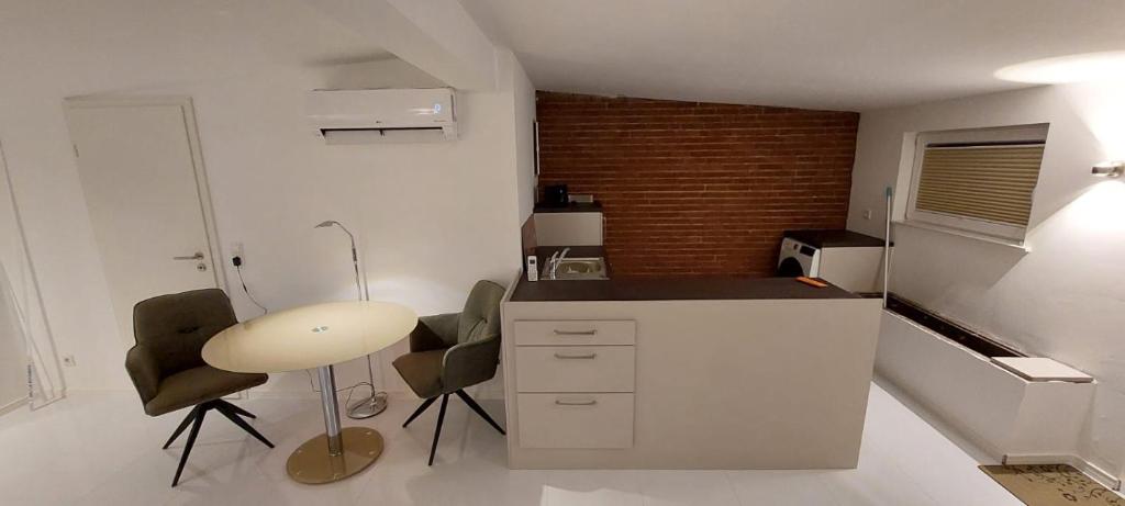 Η κουζίνα ή μικρή κουζίνα στο Gartencharlet