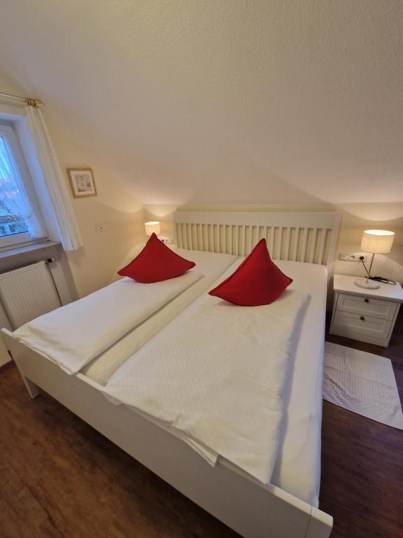 Ένα ή περισσότερα κρεβάτια σε δωμάτιο στο Haus am Mühlenweg - neue, moderne und sonnendurchflutete Appartements