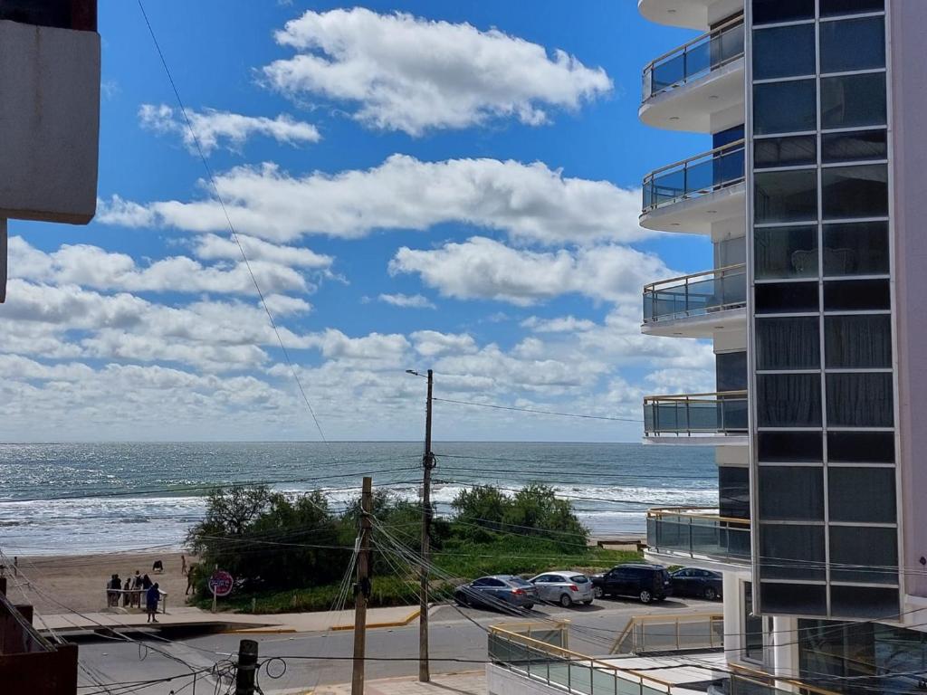 a view of the ocean from a building at Sol y Luna Hospedajes 3 in San Bernardo