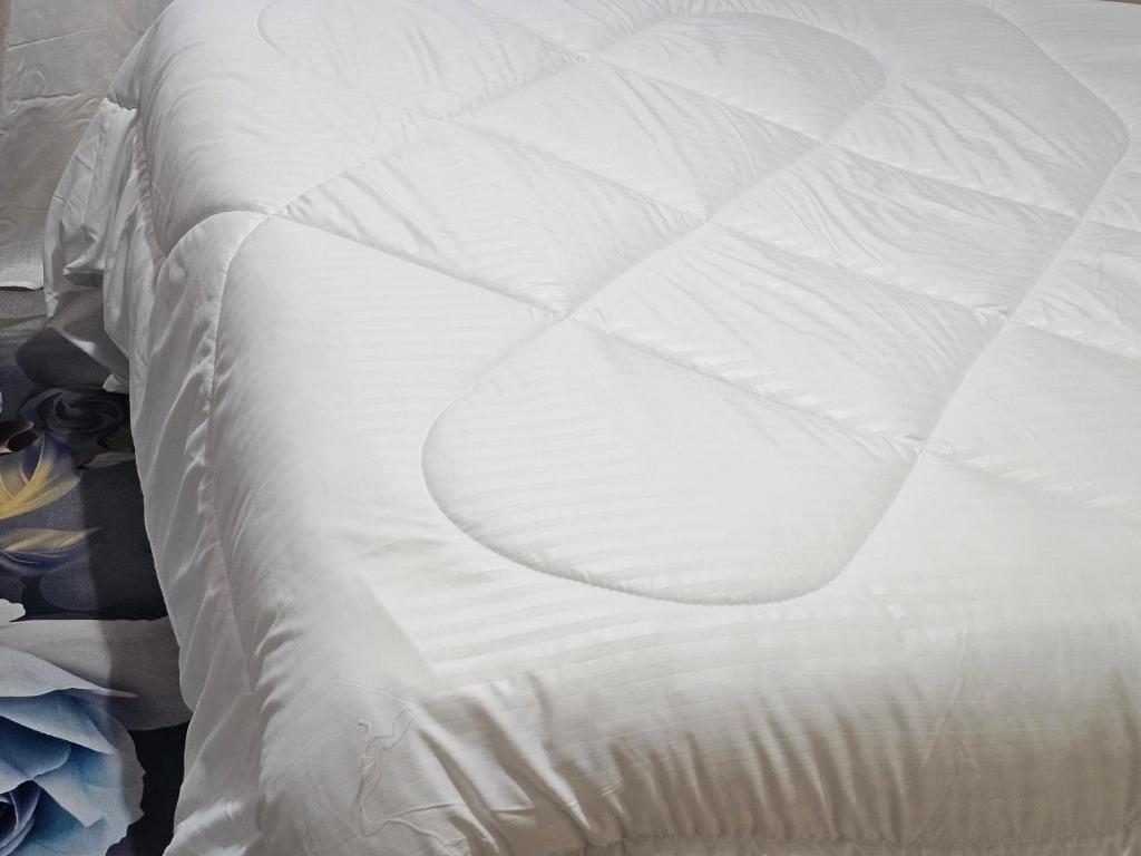 Khu vực ghế ngồi tại Rose Petals Apartments