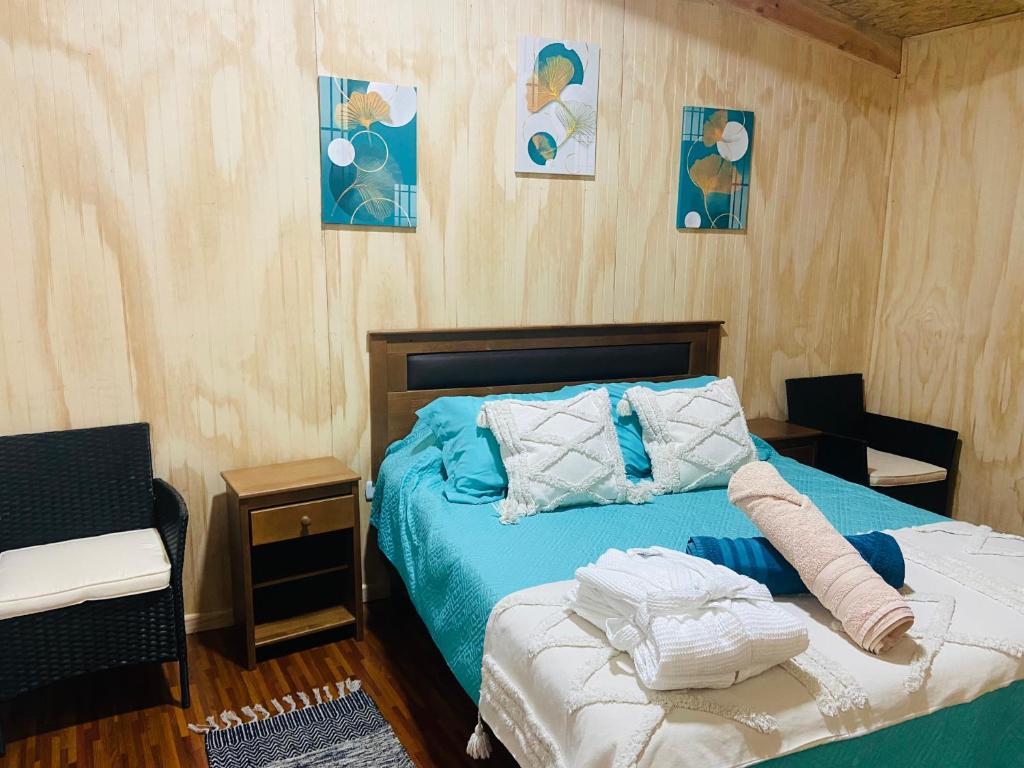 Postel nebo postele na pokoji v ubytování Cabañas con Tinajas Mahuidas Panguipulli