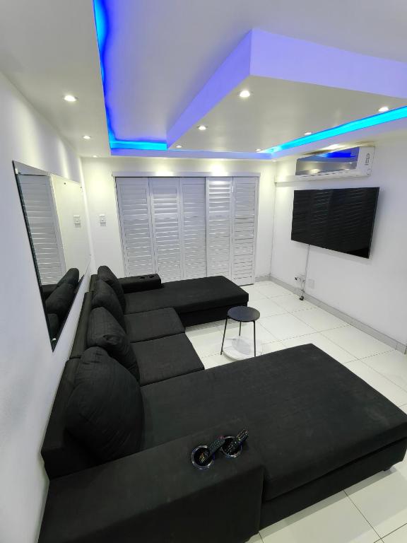 TV a/nebo společenská místnost v ubytování North beach summer sands