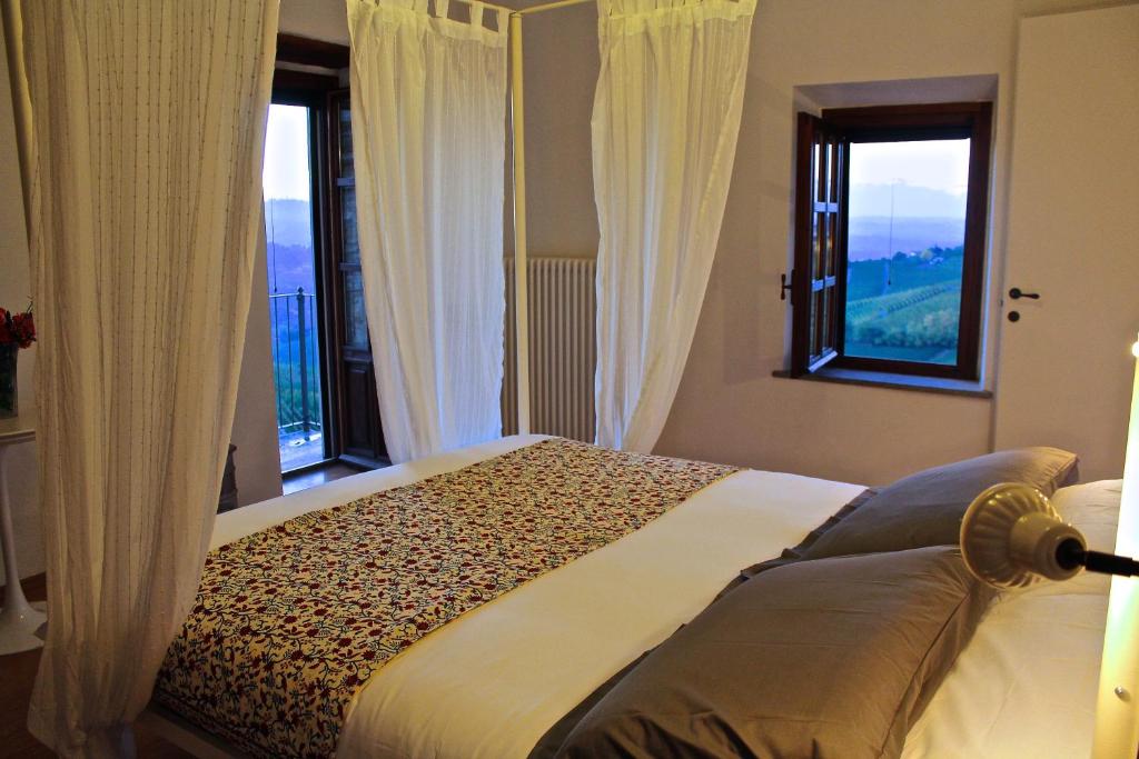 Postel nebo postele na pokoji v ubytování Casa Cucco