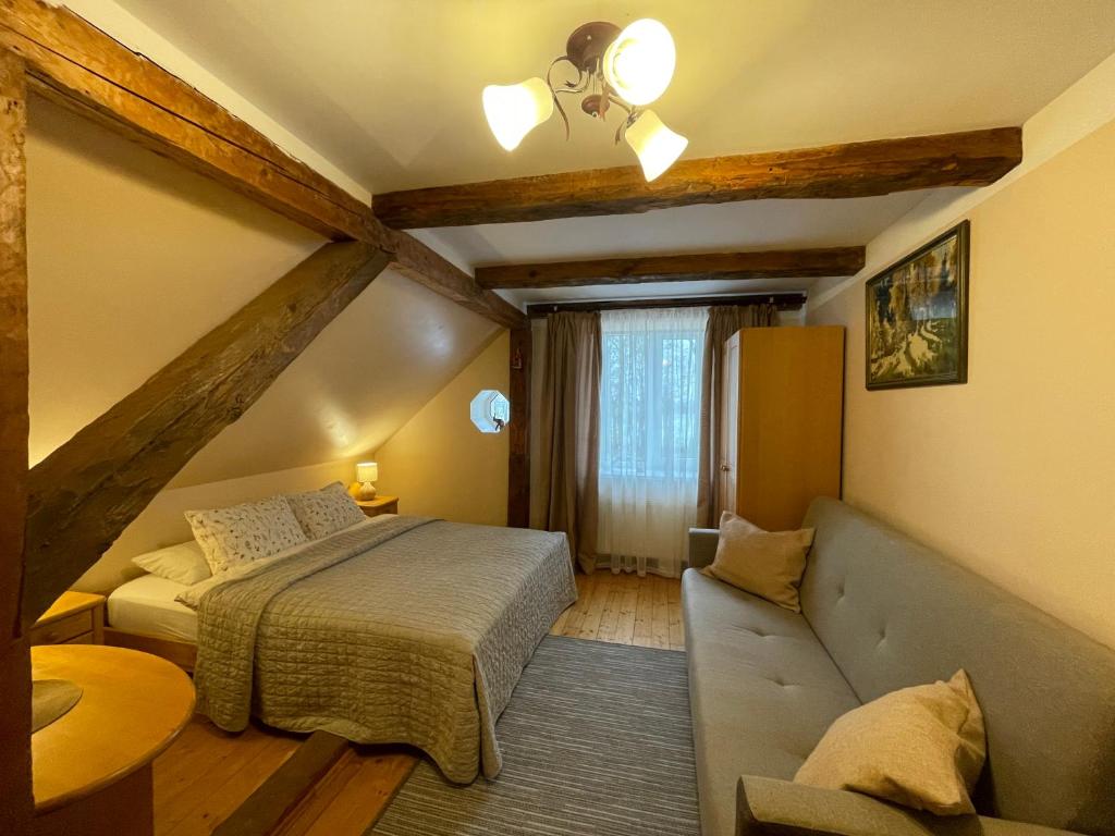 Postel nebo postele na pokoji v ubytování Viesu nams Vijas