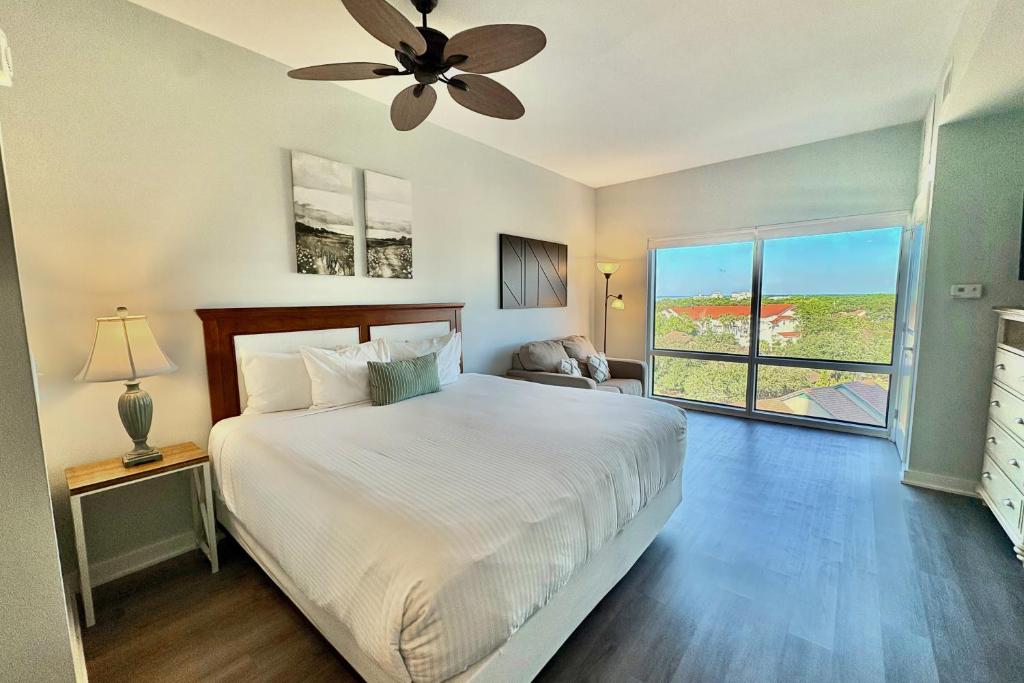 Una cama o camas en una habitación de Luau 6711