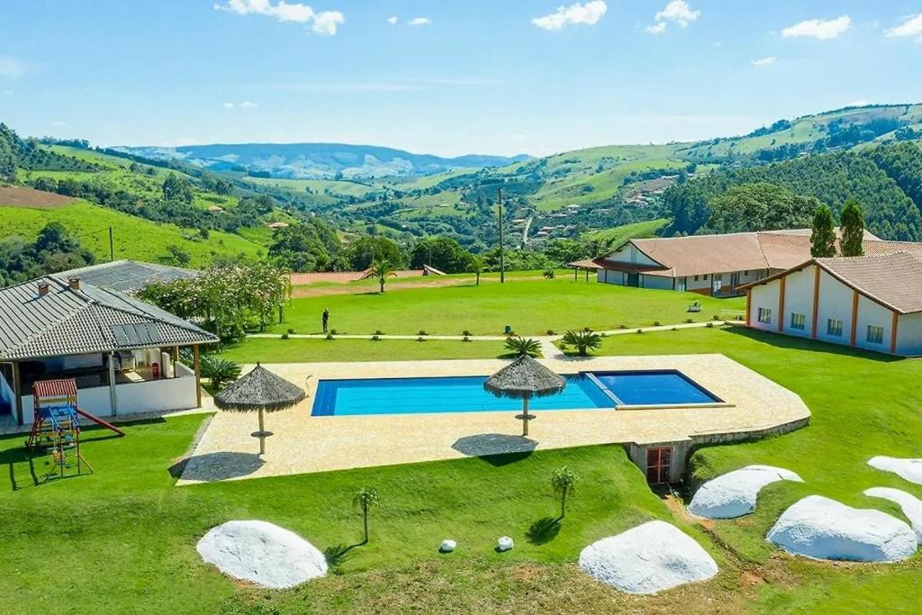 Πισίνα στο ή κοντά στο Montinni Pousada