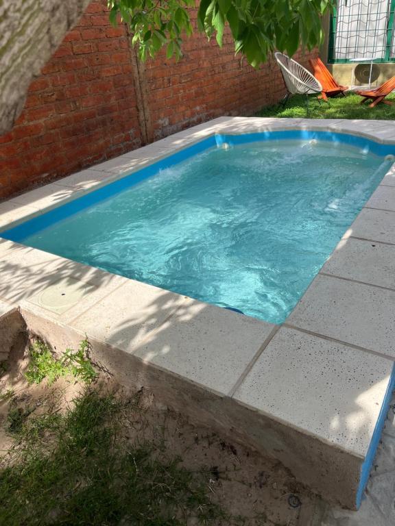 Πισίνα στο ή κοντά στο Apartamento 2 dormitorios, piscina, bicis, parrilla en corazon de maipu