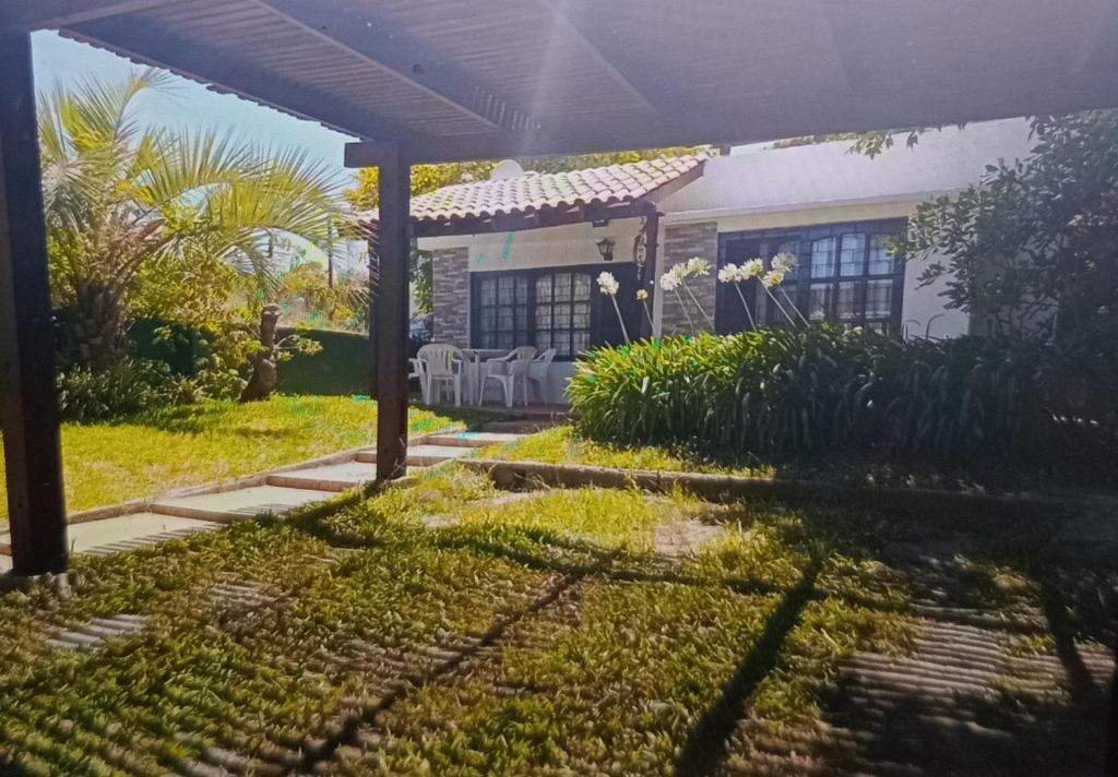 a view of a house from the backyard at Lunita in Costa Azul