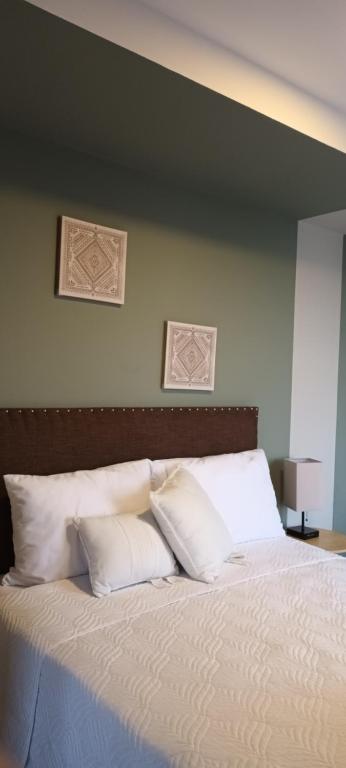 Ένα ή περισσότερα κρεβάτια σε δωμάτιο στο Loft vista 23 zona 10 parqueo balcón gym