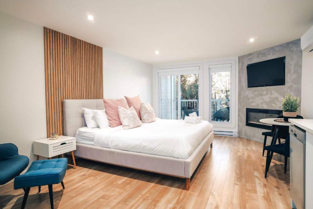 En eller flere senge i et værelse på LAO LOFT 106 by Gestion ELITE