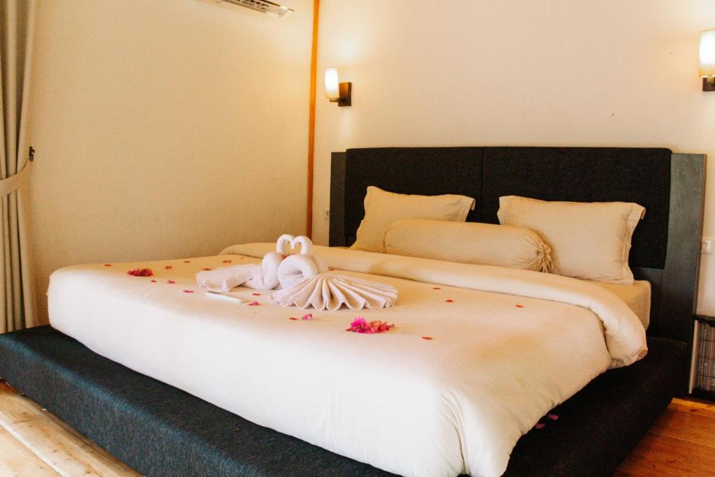 Ένα ή περισσότερα κρεβάτια σε δωμάτιο στο The Good House