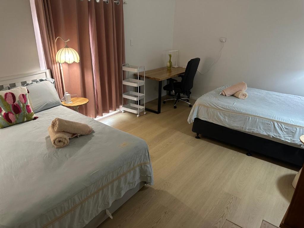 Ένα ή περισσότερα κρεβάτια σε δωμάτιο στο Granadilla ST 超大独立附属公寓G4