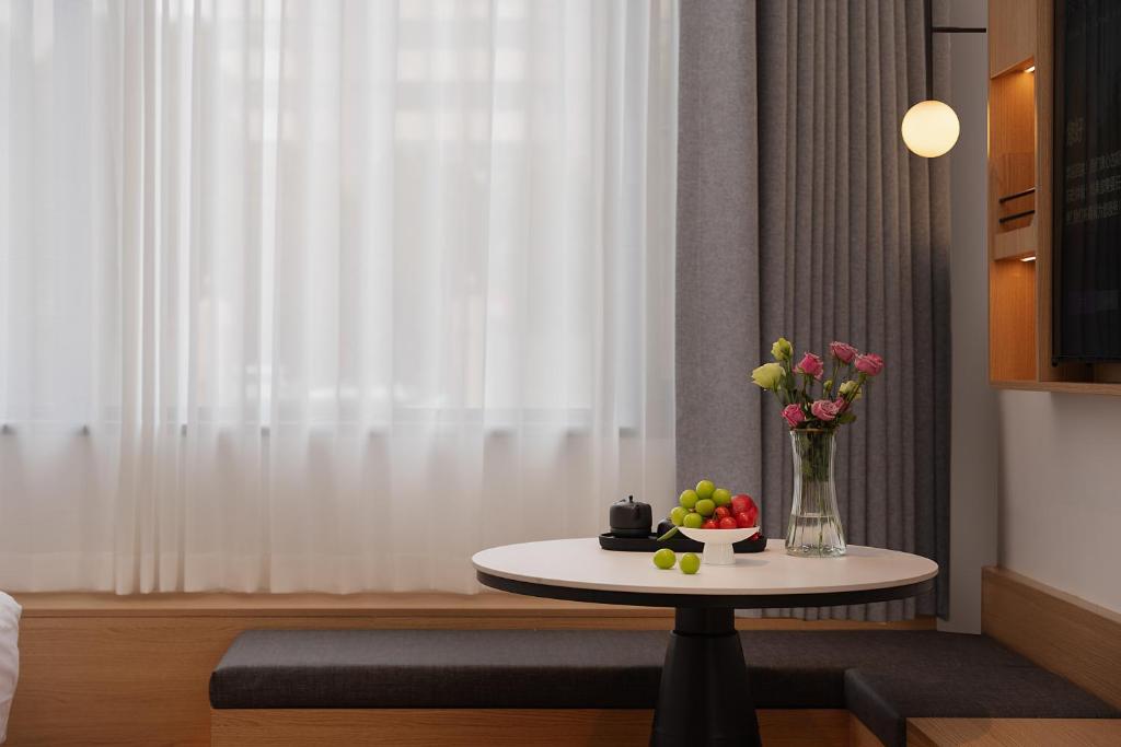 Φωτογραφία από το άλμπουμ του Clouds April Hotel, Dianchi South Asia Style First City Branch σε Kunming