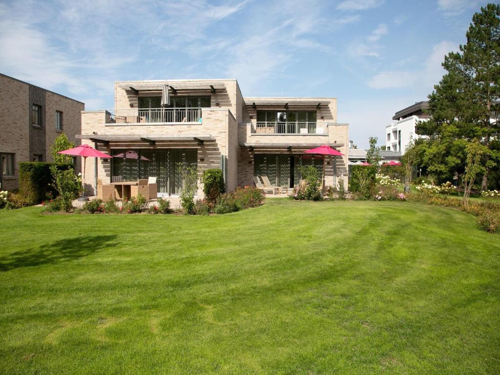 Κήπος έξω από το Aalernhus Residenzen in St Peter-Ording