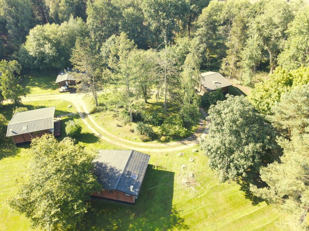 an overhead view of a house in the forest at Ferienhaus mit Garten, Eschede in Eschede