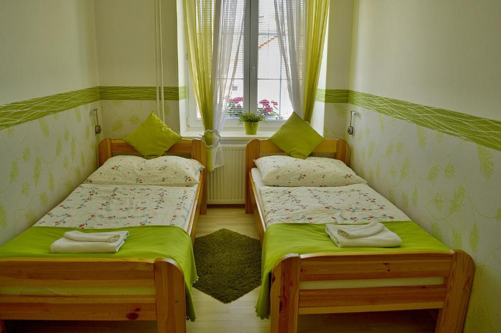 Postel nebo postele na pokoji v ubytování Hotel Florian