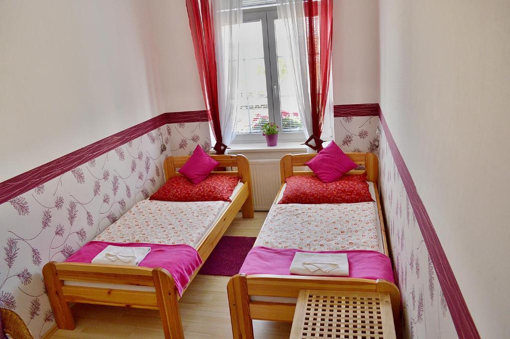Postel nebo postele na pokoji v ubytování Hotel Florian