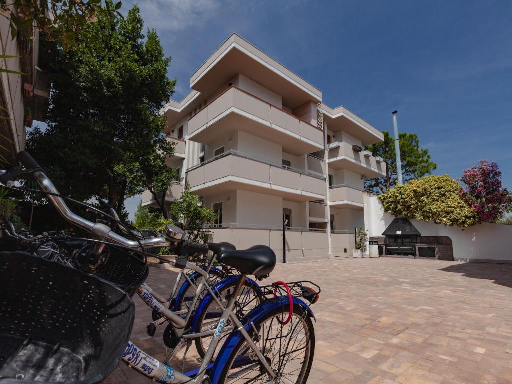 a bike parked in front of a building at Alba Adriatica apartments charm in Alba Adriatica