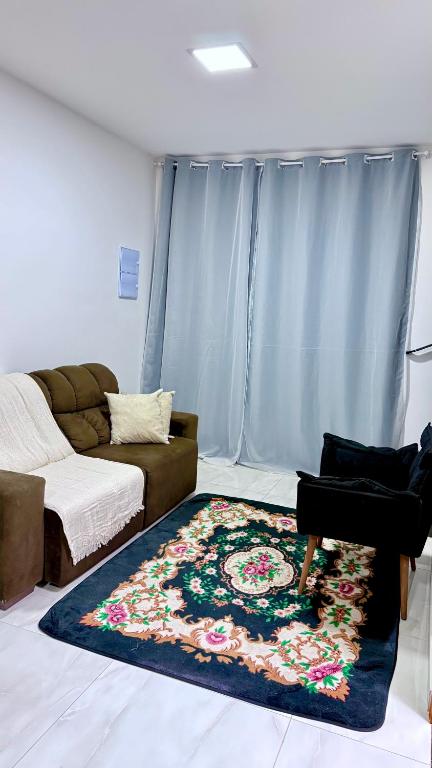 Ένα ή περισσότερα κρεβάτια σε δωμάτιο στο Casa completa em Praia Grande, 500 metros da praia