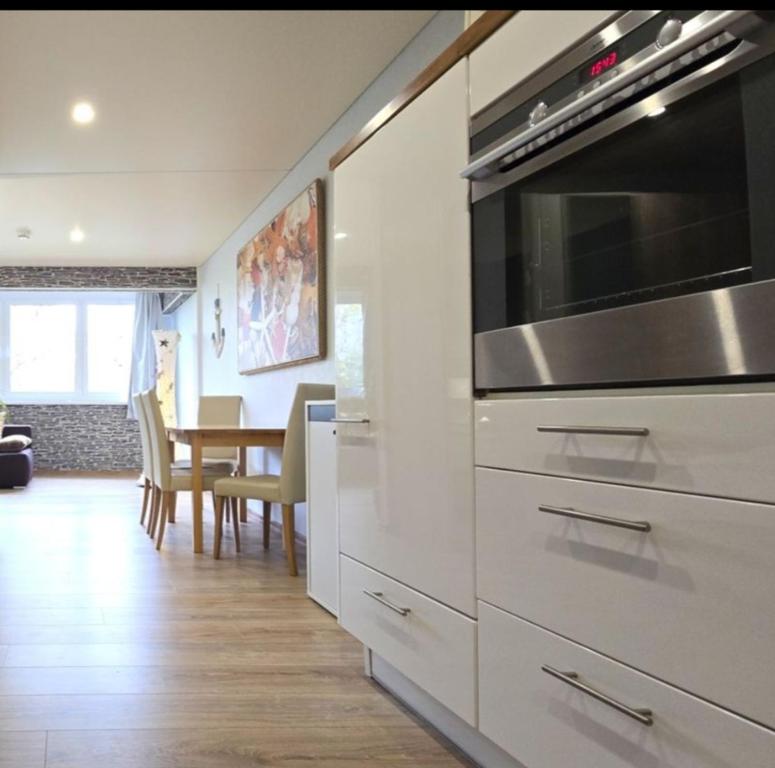 Kuchyň nebo kuchyňský kout v ubytování Seepferdchen