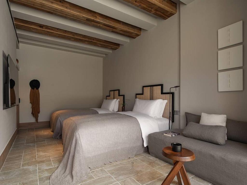 Ένα ή περισσότερα κρεβάτια σε δωμάτιο στο zhangjiajie national park Oxgen Resort