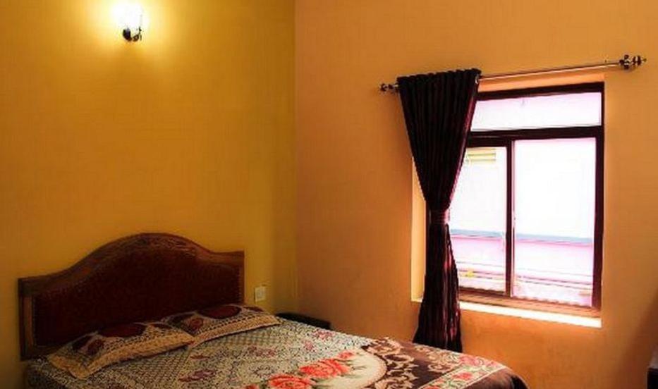Postel nebo postele na pokoji v ubytování Smm Cottage