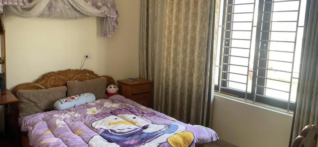 Postel nebo postele na pokoji v ubytování Lập Thảo Homestay