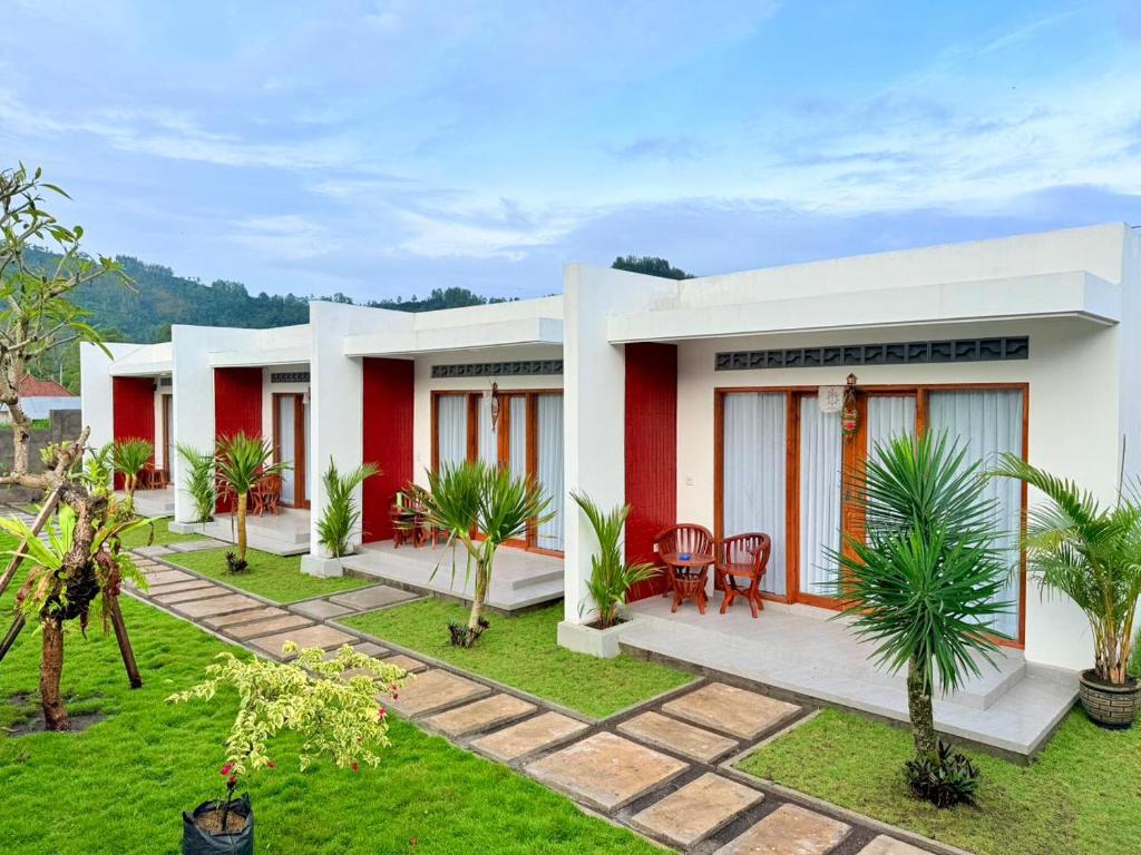 a house with red and white at Talvista Kintamani Villa in Kintamani
