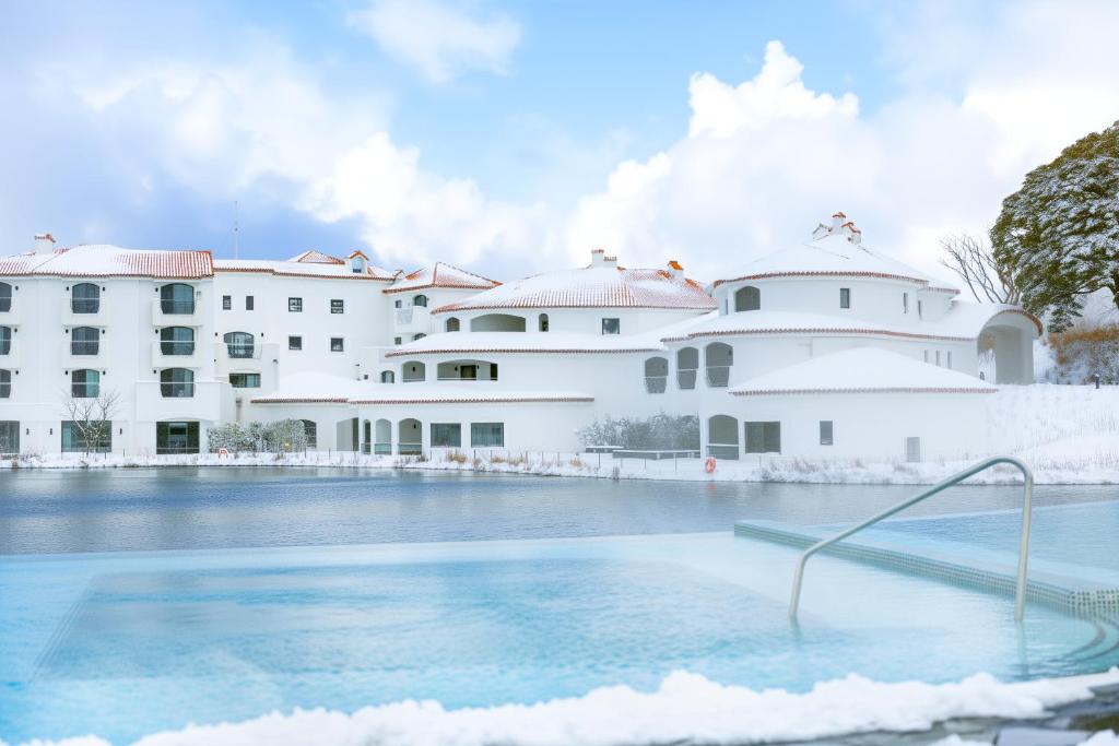 Bazén v ubytování Ecoland Hotel nebo v jeho okolí