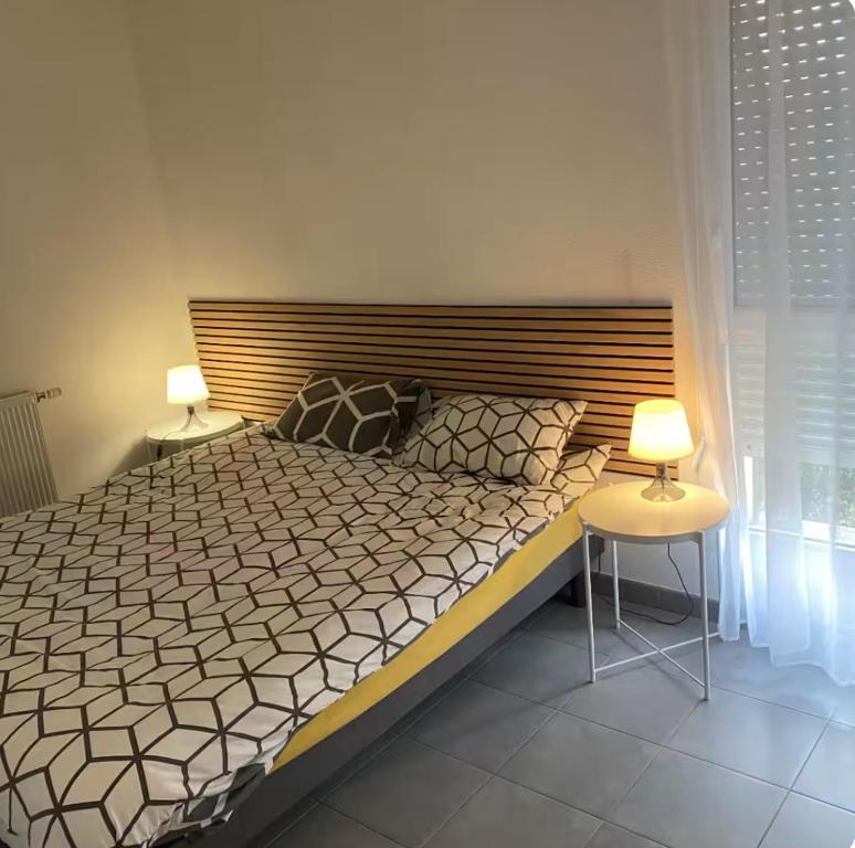 Giường trong phòng chung tại RENT T2 in quiet 2 private parking spaces