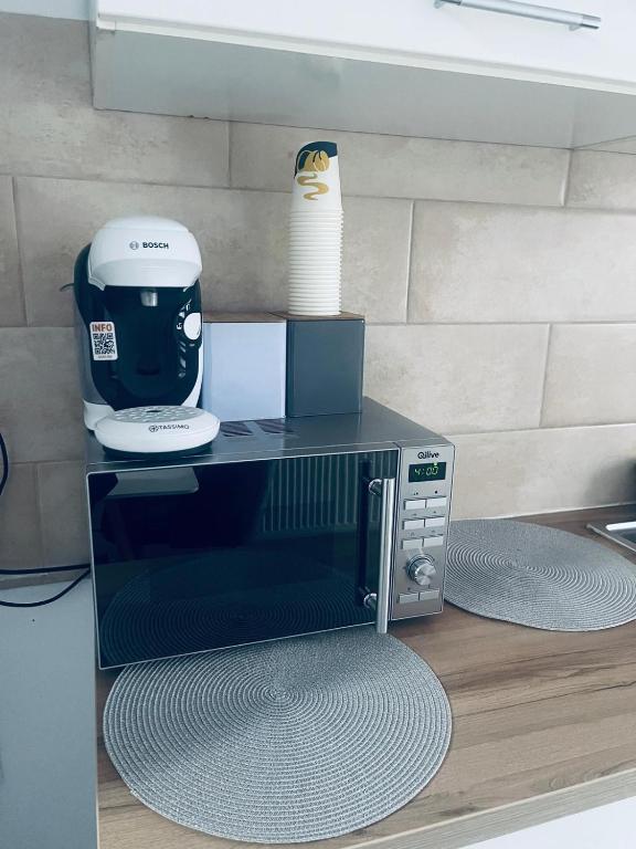 Η κουζίνα ή μικρή κουζίνα στο Magnolia Residence K&A